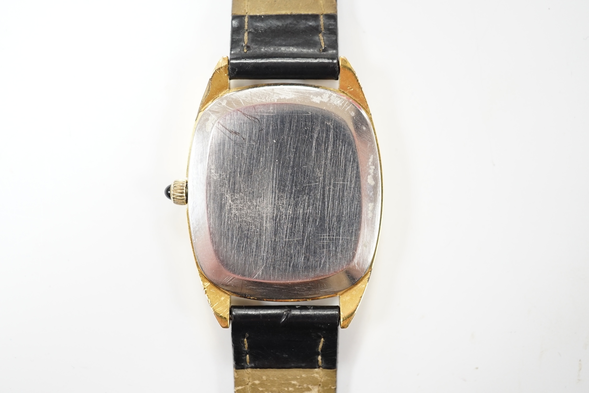 A gentleman's steel and gold plated Omega De Ville manual wind dress wrist watch, with oval Roman dial, on a leather strap, with gold plated Omega buckle, case diameter 30mm, no box or papers. Fair condition.